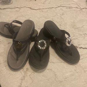 Two pairs of Crocs